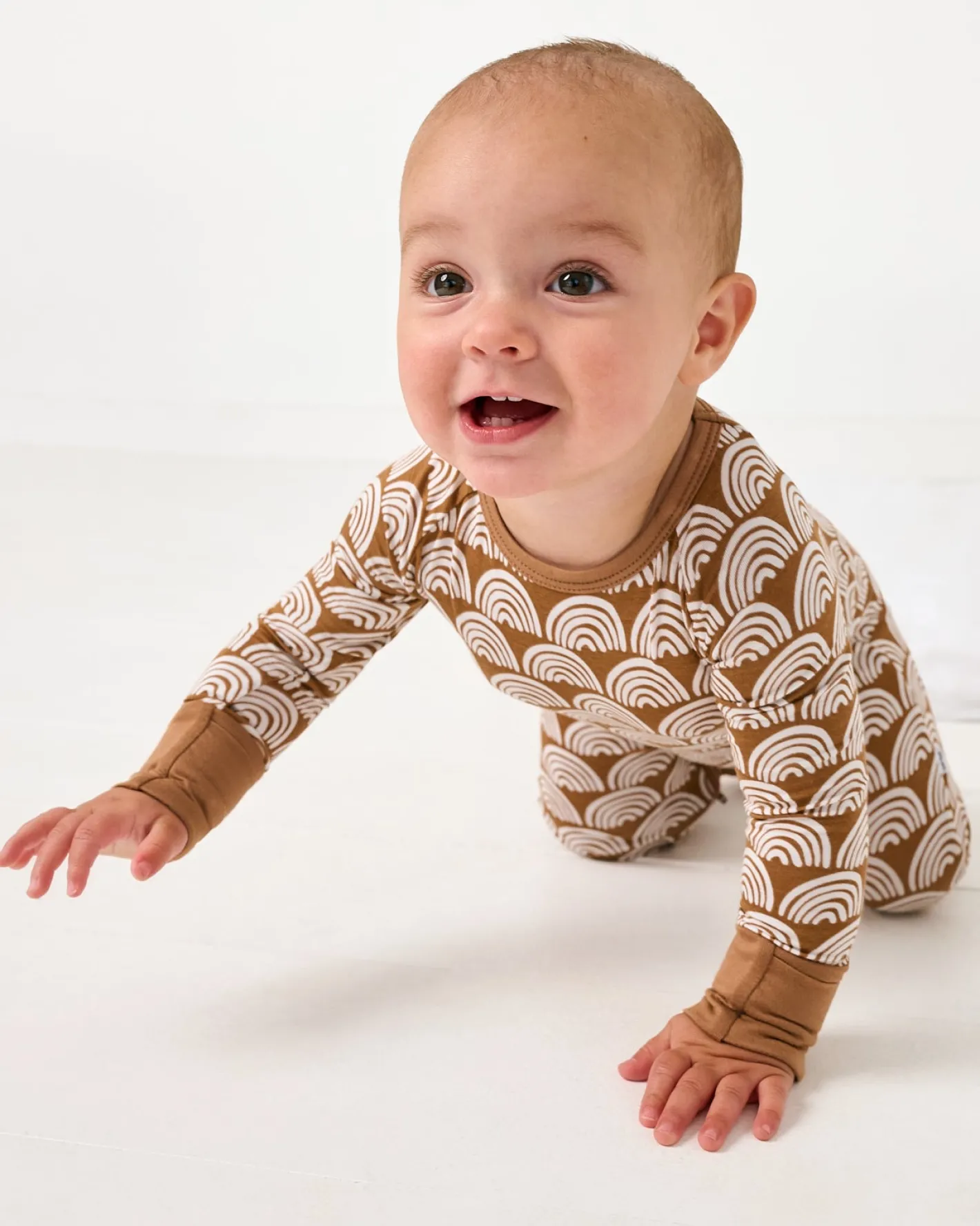 Zippies|Mommy & Me<Little Sleepies Crescent Zippy Rust Rainbows